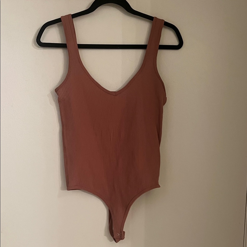 Free People Ribbed Bodysuit in Dusty Rose